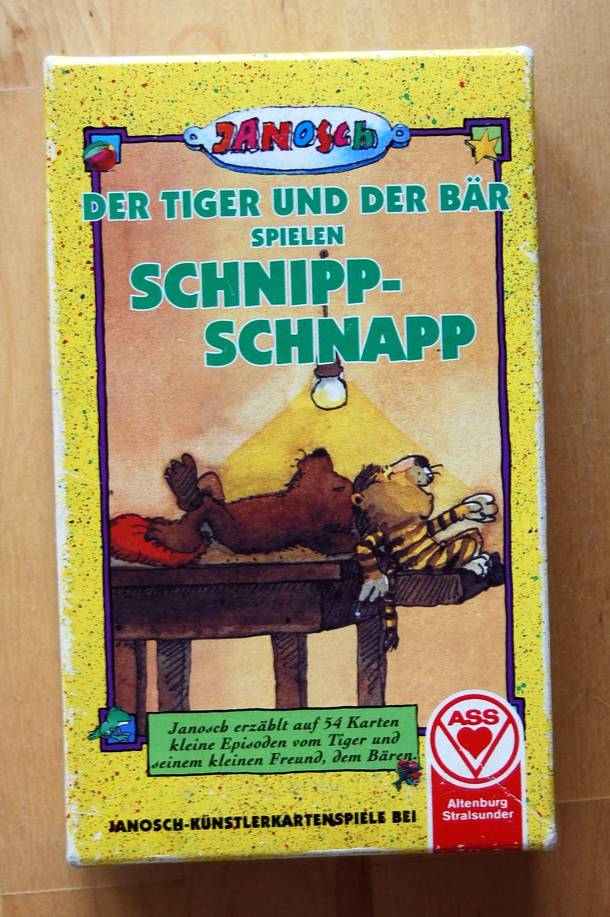 Der Tiger und der Bär spielen Schnipp-Schnapp